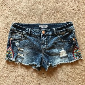 Jean shorts with tribal stitching